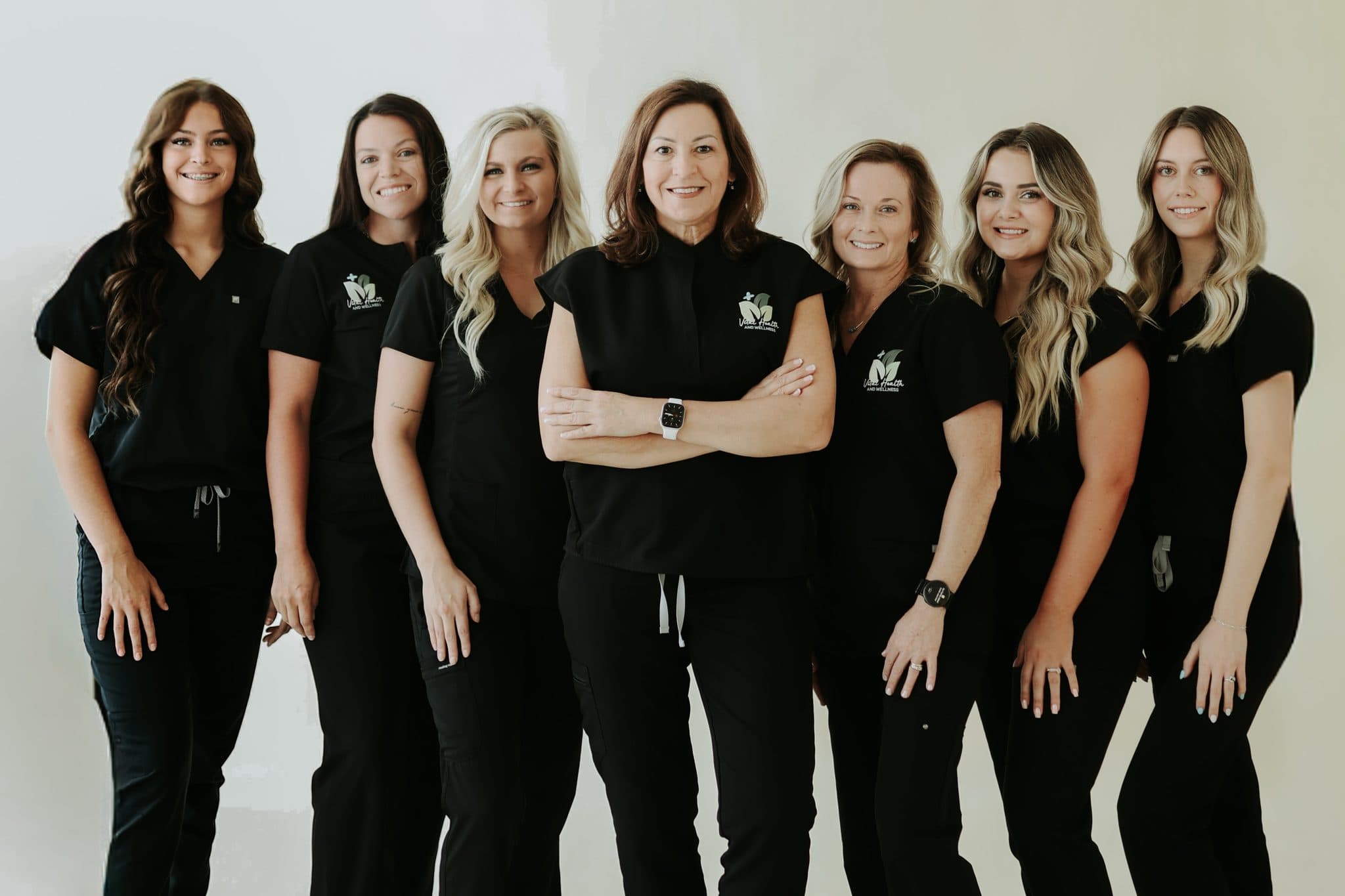 The Vital Health and Wellness team of seven providers in branded scrubs