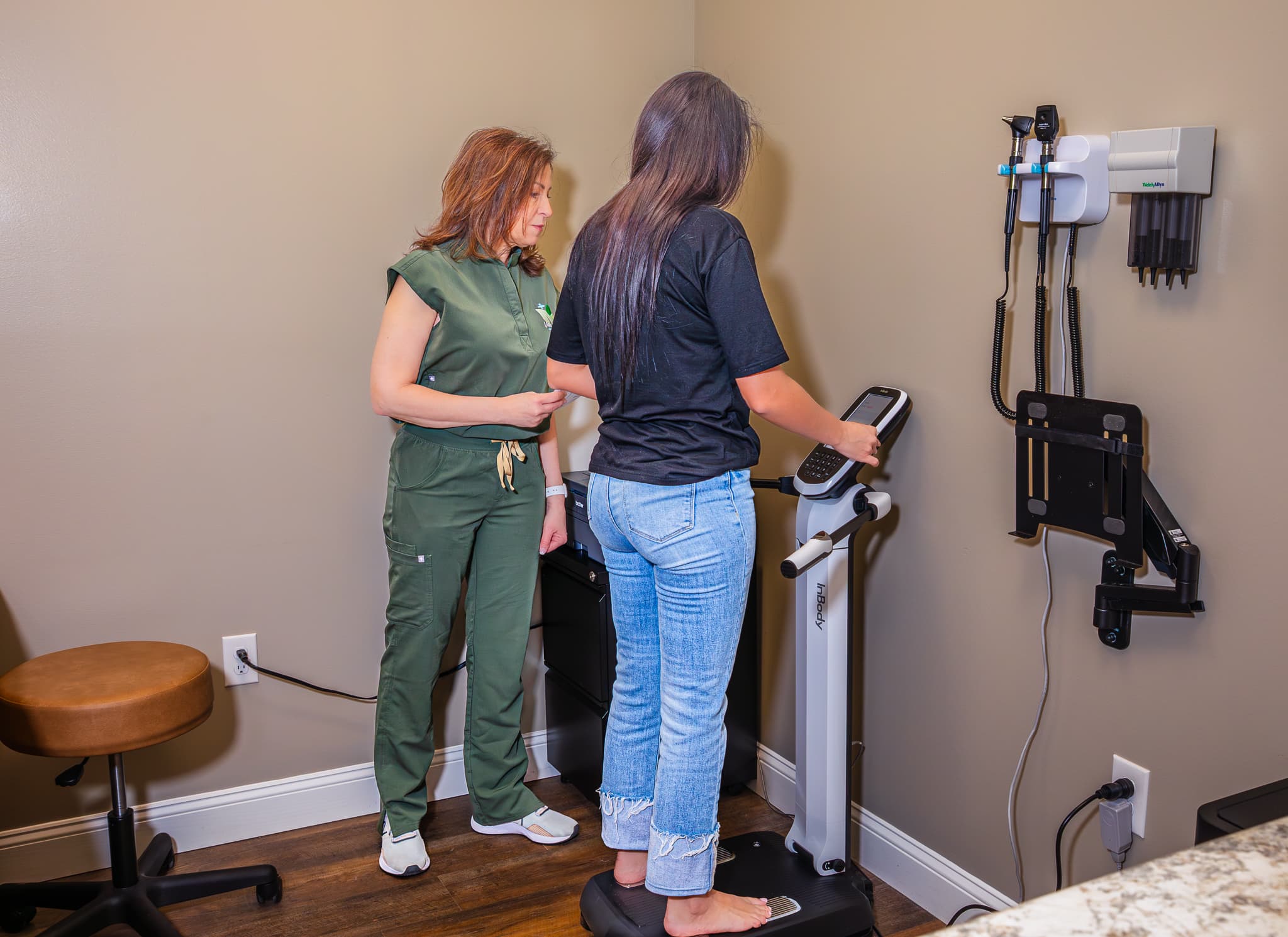 Debra Felts conducting an InBody body composition scan